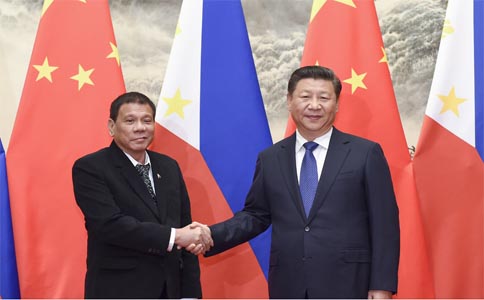 中菲关系全面恢复 各国媒体如何评价